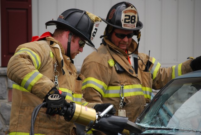 Lieutenant Chris Smith and Ambulance Capain Rob Cazillo doing an extrication demo.