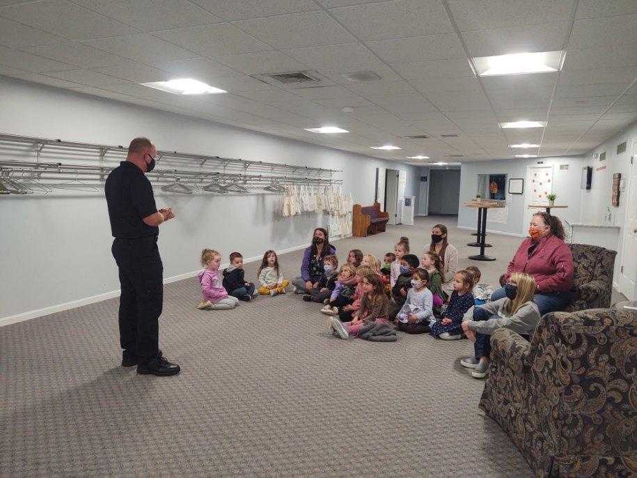 Chief Gathercole presenting to the students of Maple Grove Preschool 