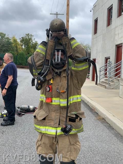 FF Roberts in FF1 Class putting on his SCBA