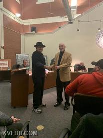 Mayor Hagen presenting to FF George Budzik